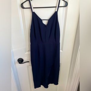 Fun, yet elegant navy midi dress with white & navy striped straps. Size XS